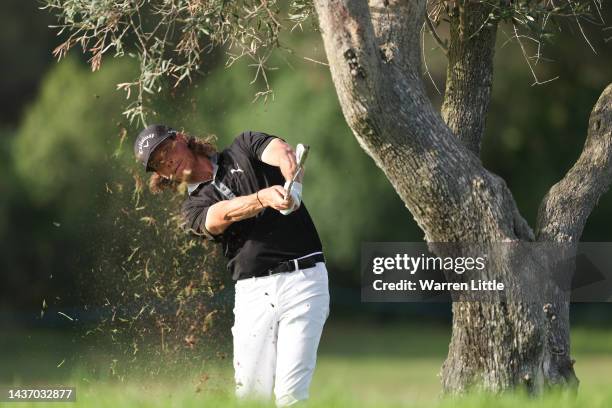 Kristoffer Broberg of Sweden plays his approach shot on the nineth hole during Day One of the Portugal Masters at Dom Pedro Victoria Golf Course on...