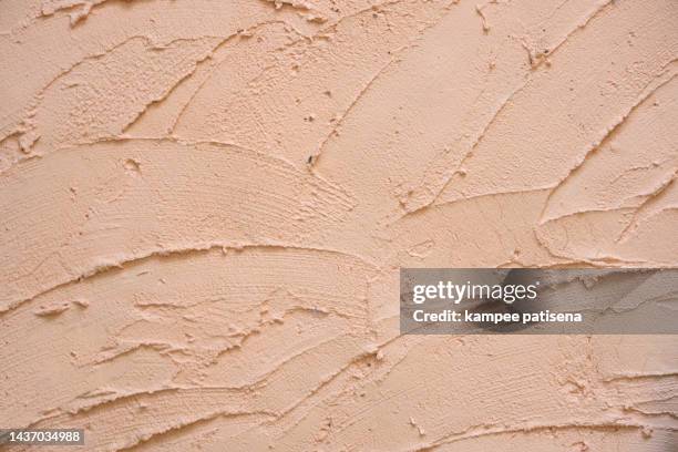 cement wall surface texture material, peach color abstract background - stuck bildbanksfoton och bilder