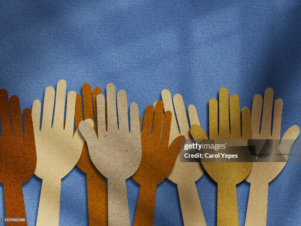 Paper hands in different skin colors.