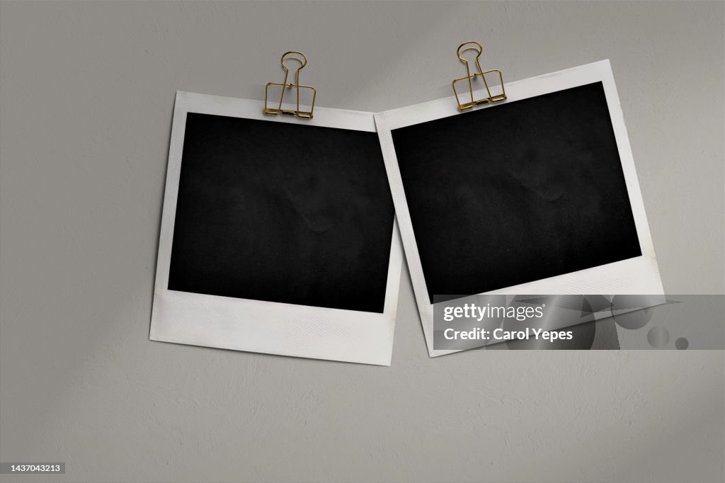 Stack of Blank Instant Print Transfer with in neutral beige background