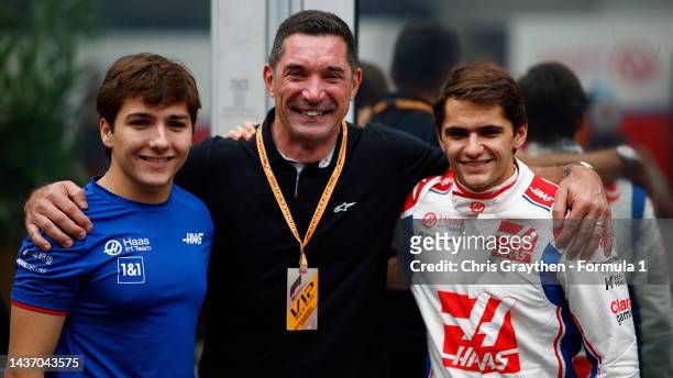 Enzo Fittipaldi, Max Papis and Pietro Fittipaldi of Brazil and Haas F1 pose for a photo in the Paddock during previews ahead of the F1 Grand Prix of...