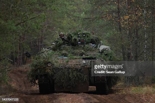 Marder infantry fighting vehicle of the Bundeswehr, the German armed forces, participates in the NATO Iron Wolf military exercises on October 27,...