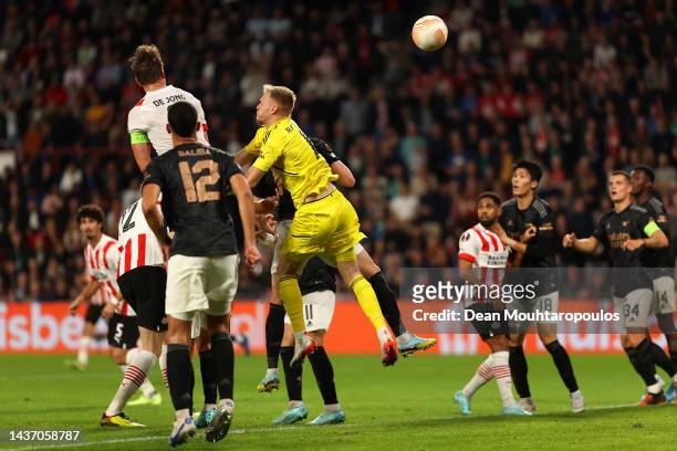 Luuk de Jong of PSV Eindhoven scores their team's second goal past Aaron Ramsdale of Arsenal during the UEFA Europa League group A match between PSV...