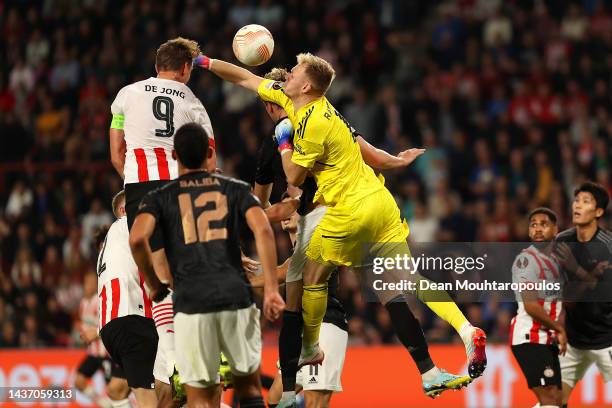 Luuk de Jong of PSV Eindhoven scores their team's second goal past Aaron Ramsdale of Arsenal during the UEFA Europa League group A match between PSV...