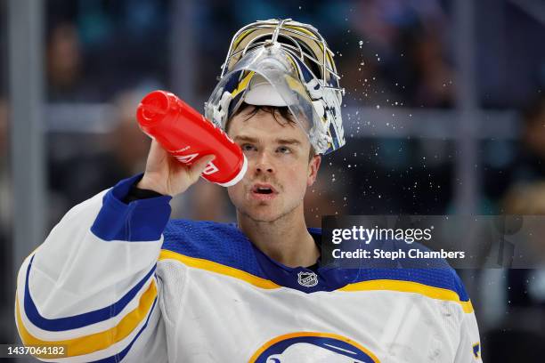 Eric Comrie of the Buffalo Sabres looks on against the Seattle Kraken during the second period at Climate Pledge Arena on October 25, 2022 in...