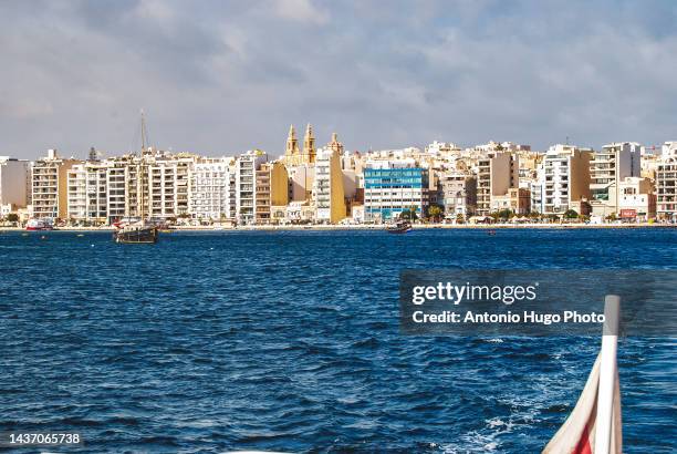 panoramic view of sliema bay in malta. - modern malta stock pictures, royalty-free photos & images