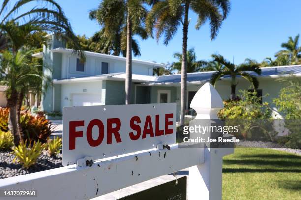 For Sale' sign is posted in front of a single family home on October 27, 2022 in Hollywood, Florida. The rate on the average 30-year fixed mortgage...