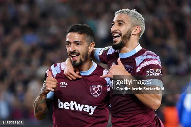 Manuel Lanzini celebrates with Said Benrahma of West Ham United after scoring their team's first goal from the penalty spot during the UEFA Europa...