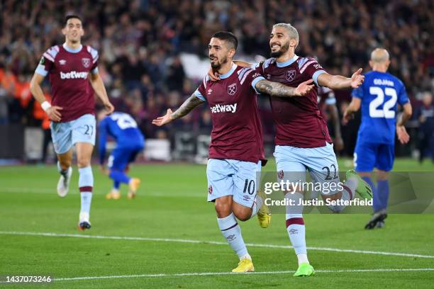 Manuel Lanzini celebrates with Said Benrahma of West Ham United after scoring their team's first goal from the penalty spot during the UEFA Europa...