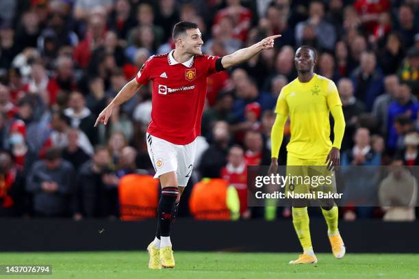 Diogo Dalot of Manchester United celebrates after scoring their team's first goal during the UEFA Europa League group E match between Manchester...