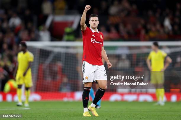 Diogo Dalot of Manchester United celebrates after scoring their team's first goal during the UEFA Europa League group E match between Manchester...