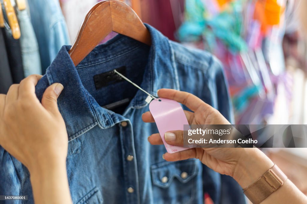 Latin woman shopping at a clothing store