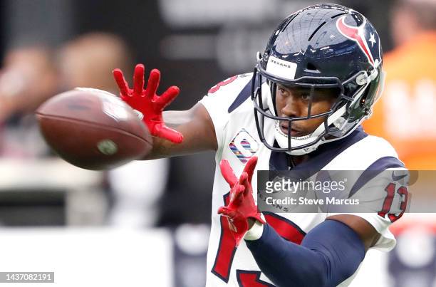Wide receiver Brandin Cooks of the Houston Texans warms up before a game against the Las Vegas Raiders at Allegiant Stadium on October 23, 2022 in...