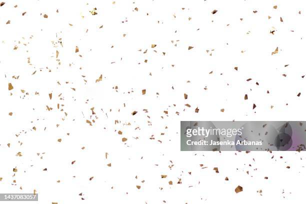 golden confetti  on the white  background - konfettiregen stock-fotos und bilder