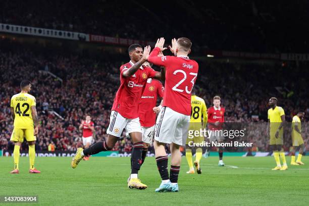 Marcus Rashford celebrates with Luke Shaw of Manchester United after scoring their team's second goal during the UEFA Europa League group E match...