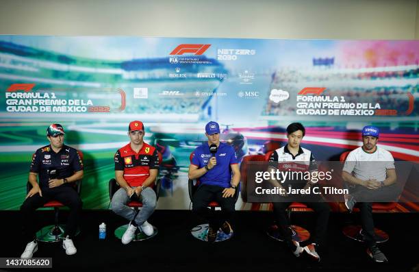 Sergio Perez of Mexico and Oracle Red Bull Racing, Charles Leclerc of Monaco and Ferrari, Mick Schumacher of Germany and Haas F1, Zhou Guanyu of...