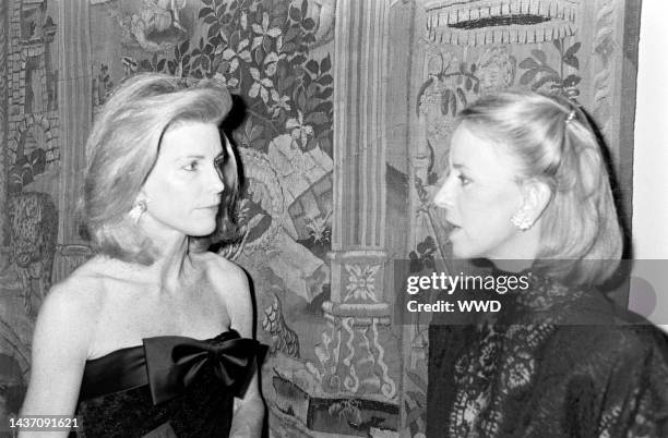 Nancy Richardson and Anne Bass attend an event at the Dakota, an apartment building in New York City, on December 1, 1987.