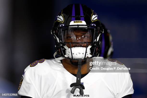 Lamar Jackson of the Baltimore Ravens takes the field for pregame warm-ups prior to playing the Tampa Bay Buccaneers at Raymond James Stadium on...