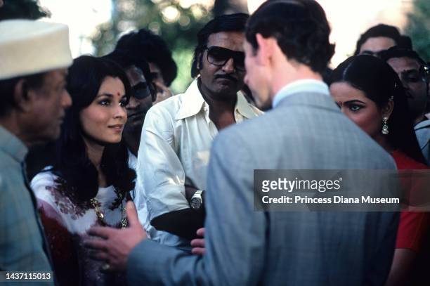 Prince Charles, Prince of Wales talks with a group of people, including Indian film producer V Shantaram Indian actress Padmini Kolhapure , during a...