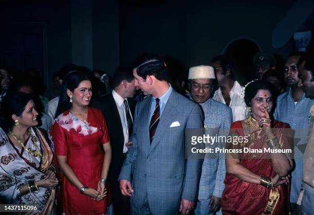 From second left, Indian actress Padmini Kolhapure , Prince Charles, Prince of Wales , and Indian film producer V Shantaram stand together, with...