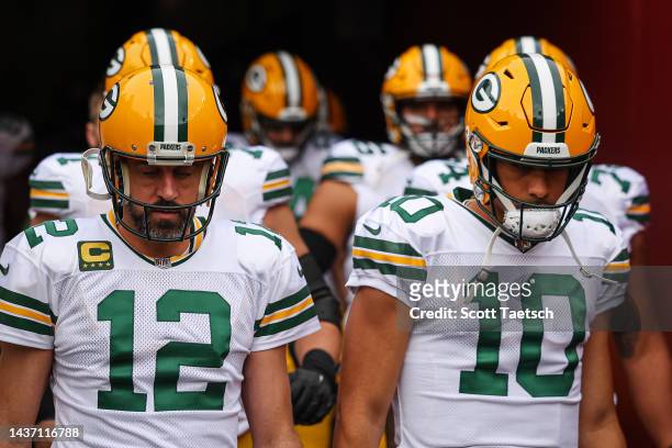 Quarterbacks Aaron Rodgers and Jordan Love of the Green Bay Packers take the field before the game against the Washington Commanders at FedExField on...