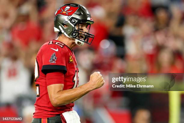 Tom Brady of the Tampa Bay Buccaneers reacts after a touchdown against the Baltimore Ravens during the first quarter at Raymond James Stadium on...