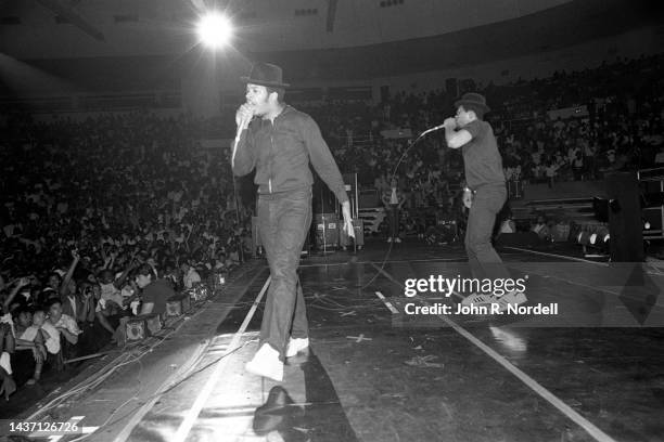 American rapper, producer, DJ and television personality Joseph "Run" Simmons and rapper Darryl "DMC" McDaniels, of the American hip hop group...