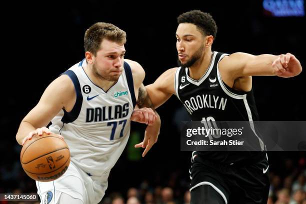 Luka Doncic of the Dallas Mavericks dribbles against Ben Simmons of the Brooklyn Nets during the second half at Barclays Center on October 27, 2022...