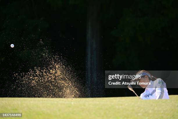 Chie Arimura of Japan hits out from a bunker on the 11th hole during the first round of the Mitsubishi Electric/Hisako Higuchi Ladies at Musashigaoka...