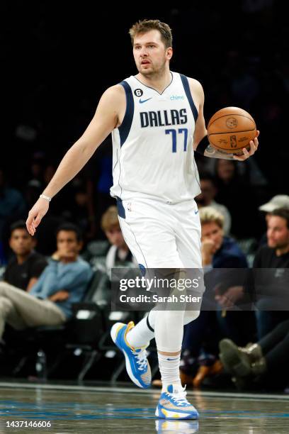 Luka Doncic of the Dallas Mavericks dribbles during the second half against the Brooklyn Nets at Barclays Center on October 27, 2022 in the Brooklyn...