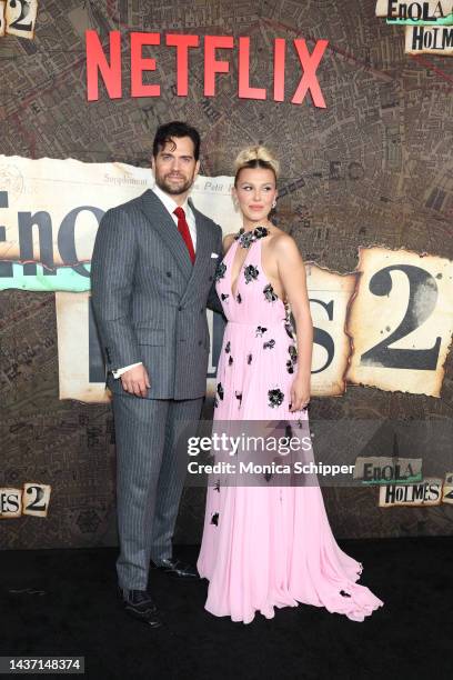 Henry Cavill and Millie Bobby Brown and Harry Bradbeer attend the Netflix Enola Holmes 2 Premiere on October 27, 2022 in New York City.