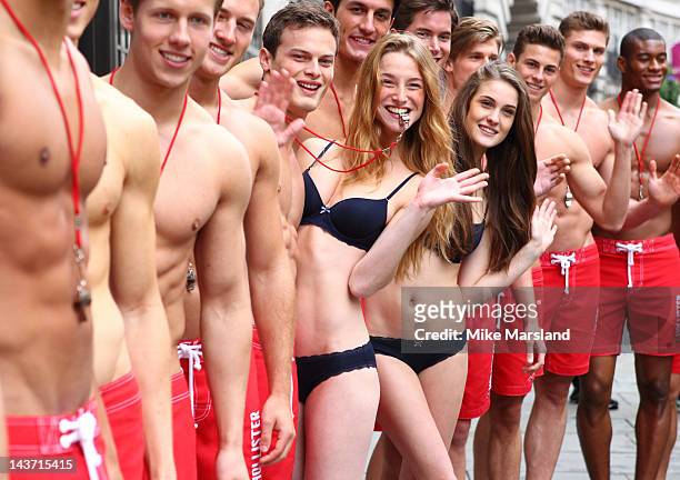 Hot Life guards pose for the opening of the Gilly Hicks and Hollister store on May 3, 2012 in London, England.