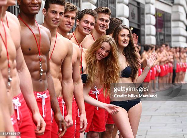 Hot Life guards pose for the opening of the Gilly Hicks and Hollister store on May 3, 2012 in London, England.