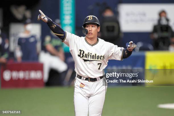 Masataka Yoshida of the Orix Buffaloes celebrates hitting the game-winning two run home run in the 9th inning against Yakult Swallows during the...