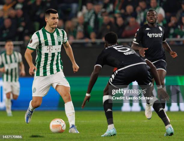 Amer Gojak of Ferencvarosi TC controls the ball during the UEFA Europa League group H match between Ferencvarosi TC and AS Monaco at Ferencvaros...