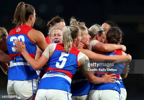 Bulldogs celebrate the goal of Ellie Blackburn of the Bulldogs during the round 10 AFLW match between the Carlton Blues and the Western Bulldogs at...
