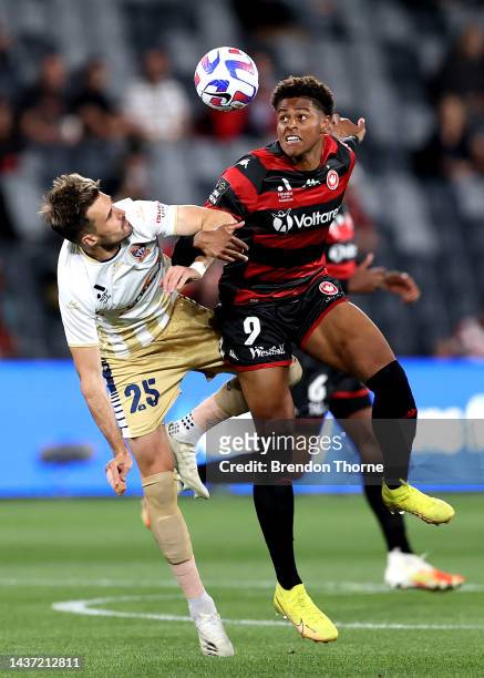 Kusini Yengi of the Wanderers competes with Carl Jenkinson of the Jets during the round four A-League Men's match between Western Sydney Wanderers...
