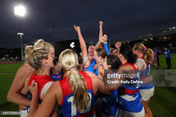 Bulldogs players celebrate victory during the round 10 AFLW match between the Carlton Blues and the Western Bulldogs at Ikon Park on October 28, 2022...