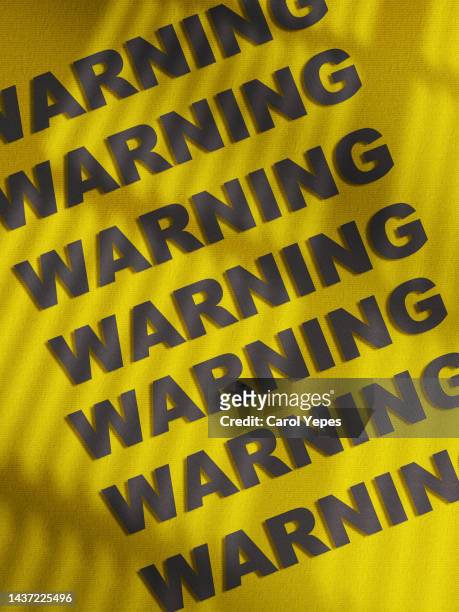 warning message in yellow surface - vertical banner stock pictures, royalty-free photos & images