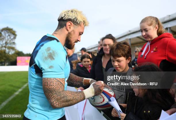 Jack Nowell of England signs autographs after a England Open Training Session at Jersey Rugby Club on October 28, 2022 in Saint Peter, Jersey.