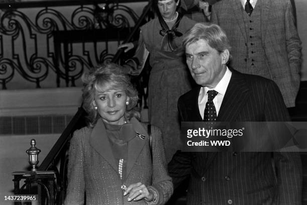 Barbara Walters and John Warner attend an event at the British embassy in Washington, D.C., on November 11, 1985.