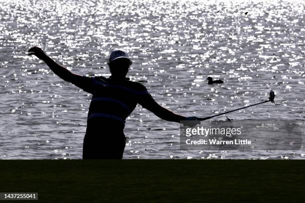 Nacho Elvira of Spain reacts after playing their second shot on the 18th hole during Day Two of the Portugal Masters at Dom Pedro Victoria Golf...