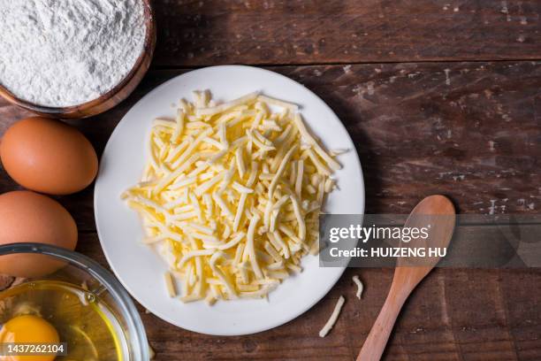 shredded cheese, eggs and flour - grated stock pictures, royalty-free photos & images