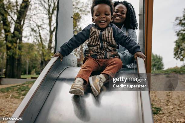 we have fun together - baby pullover stockfoto's en -beelden