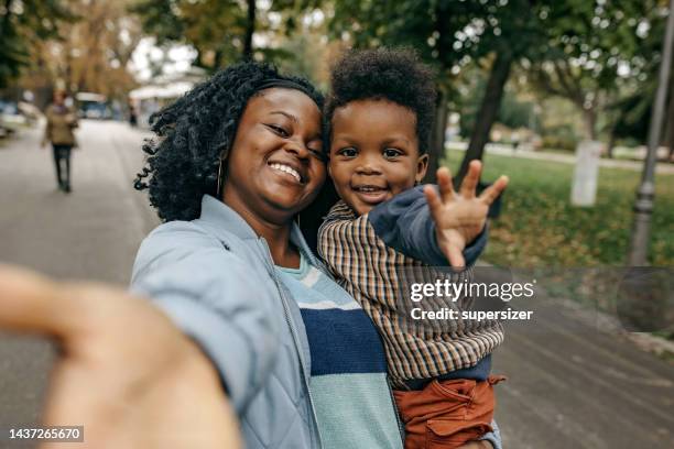 happy family - young family outside stock pictures, royalty-free photos & images