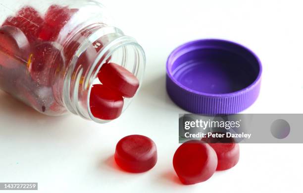 kids' multivitamin, blackcurrant flavour - jelly sweet stock pictures, royalty-free photos & images