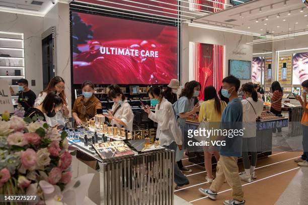 Customers shop at Haikou International Duty Free City Complex on the opening day on October 28, 2022 in Haikou, Hainan Province of China.