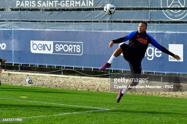 Kylian Mbappe controls the ball during a Paris Saint-Germain training session at PSG training center on October 28, 2022 in Paris, France.