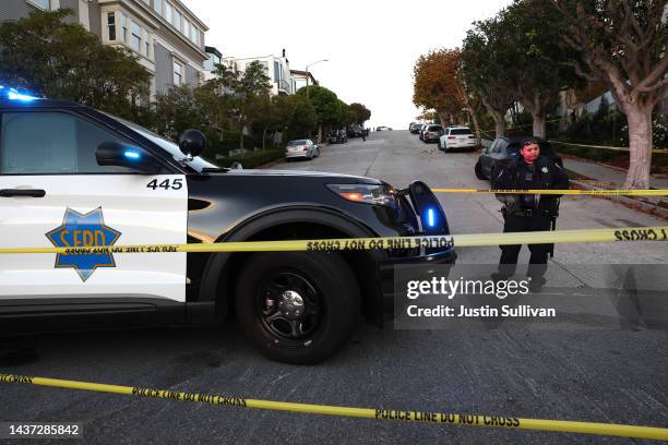 San Francisco police officer stands guard in front of the home of U.S. Speaker of the House Nancy Pelosi on October 28, 2022 in San Francisco,...