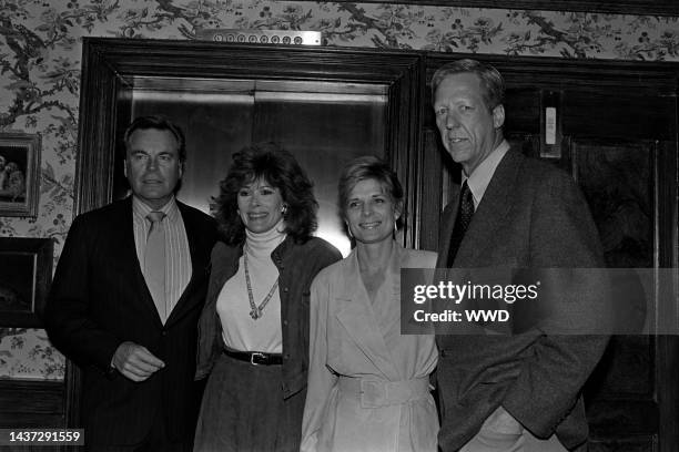 Robert Wagner, Jill St. John, Maureen Downey, and David Hartman attend an event at the Ritz Carlton Hotel in Washington, D.C., on December 6, 1987.